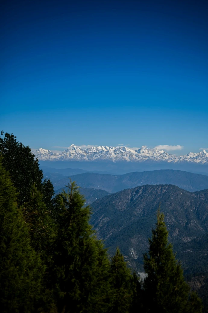 a view of a mountain range from a distance